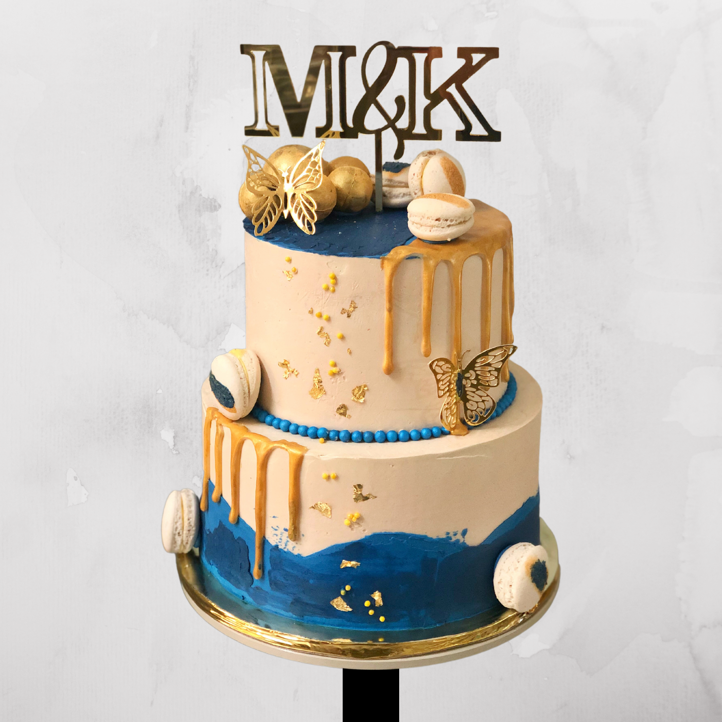 Gold & Blue Macaron Drip Cake